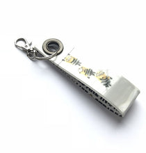 Įkelti vaizdą į galerijos rodinį, Atšvaitas pakabukas Pimpačkiukai / Reflective Minions loop strap - Neshkis